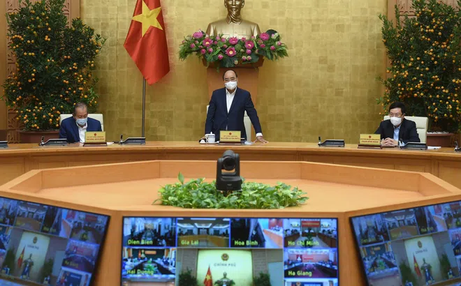 Thủ tướng yêu cầu nhanh chóng tiêm chủng vắc xin COVID-19 và khơi thông ách tắc hàng hóa