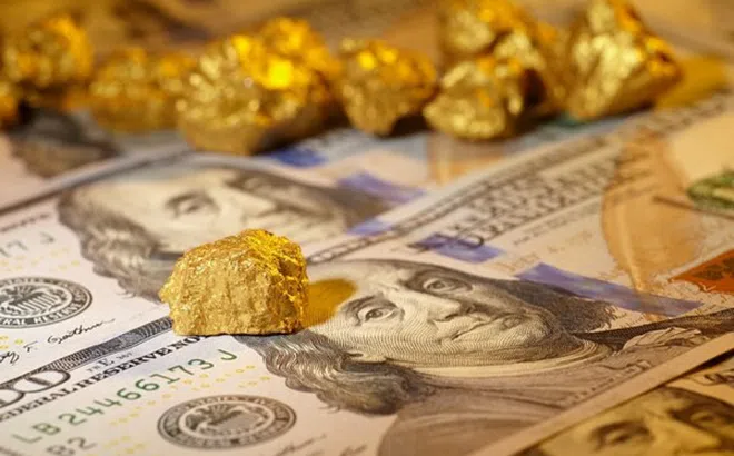 Chịu áp lực của đồng USD, giá vàng thế giới giảm nhẹ
